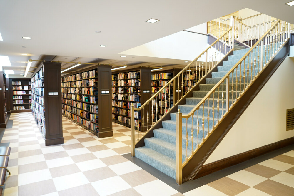 Fiction Department stairs and bookshelves