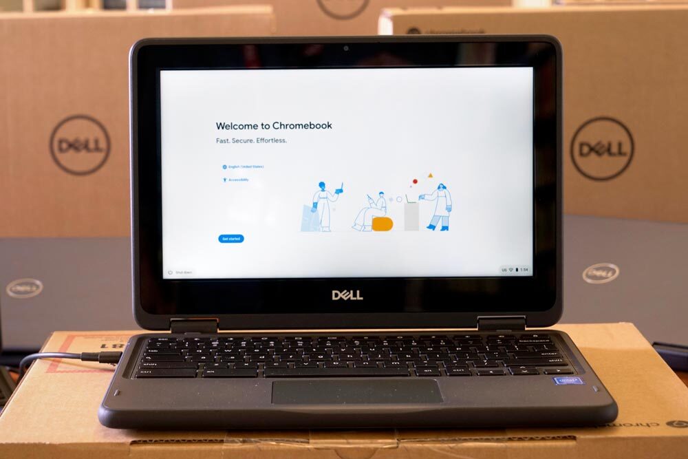 Dell Chromebooks - open laptop on Dell boxes