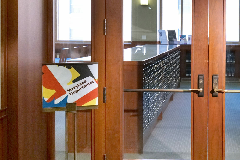 Maryland Department entrance with sign and card catalog drawers inside