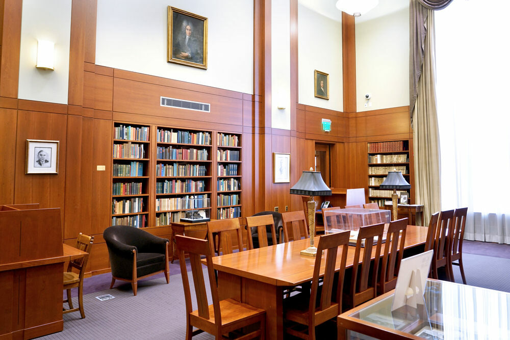 H. L. Mencken Room view with table, bookshelves, and window