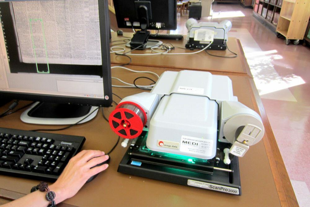 browsing a newspaper on microfilm