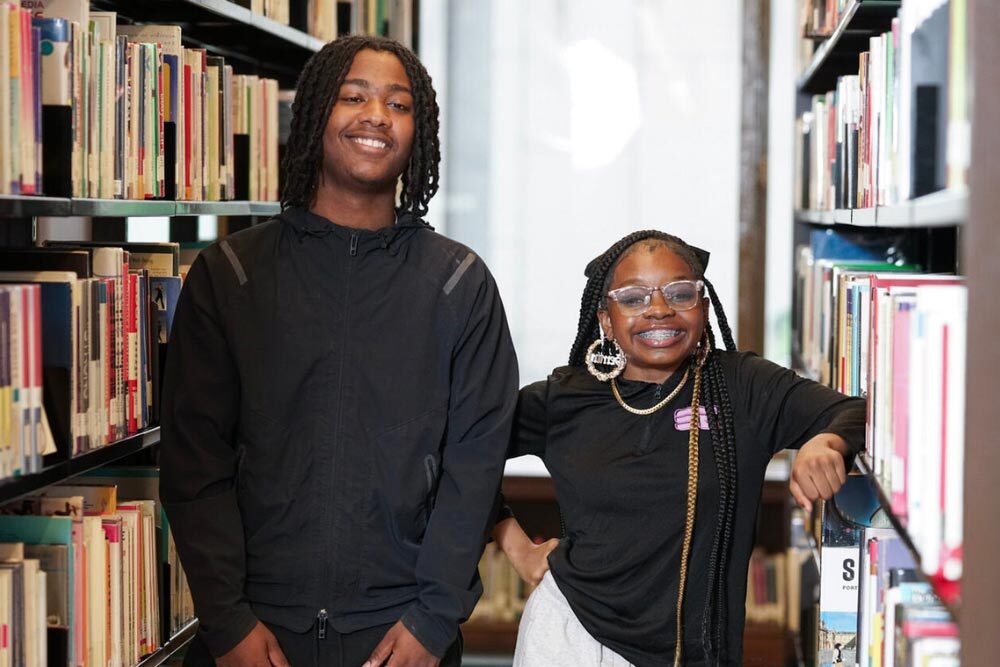 smiling teens at a Pratt Library program