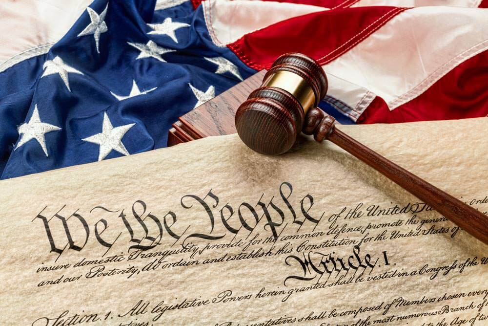 civic engagement - We the People document, US flag, gavel