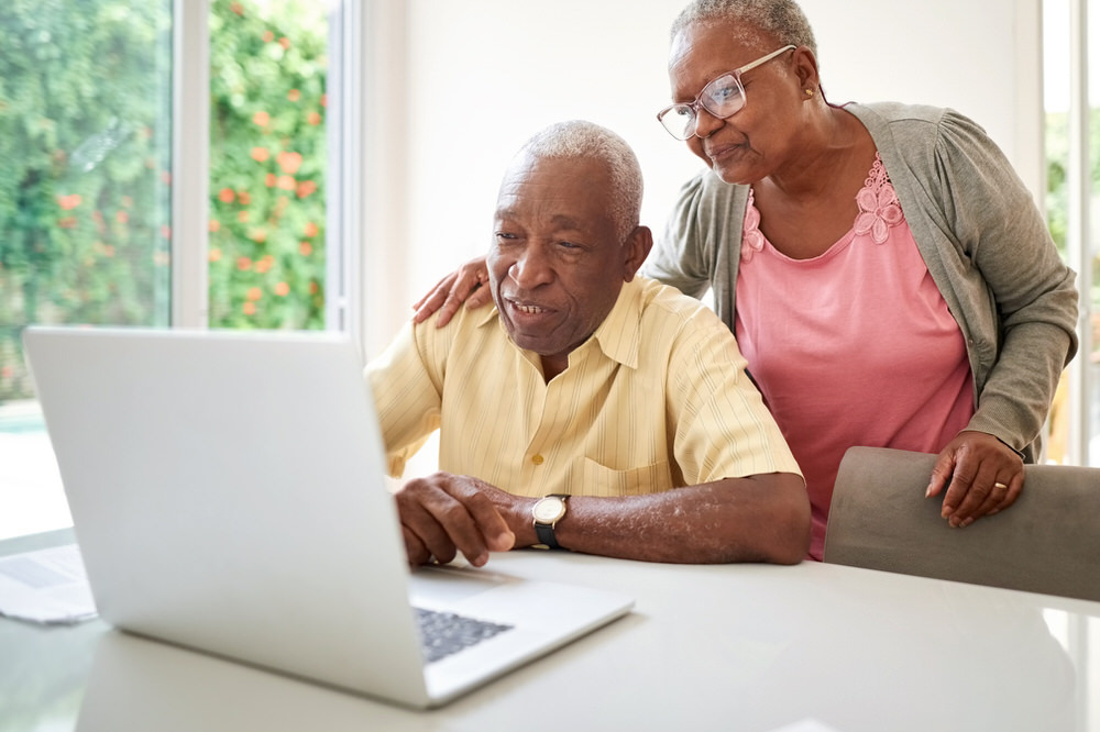 Computer learning at home - senior adults learning skills online