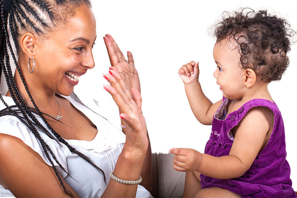 Early Learning events, May 2025 - showing an adult and toddler learning by clapping