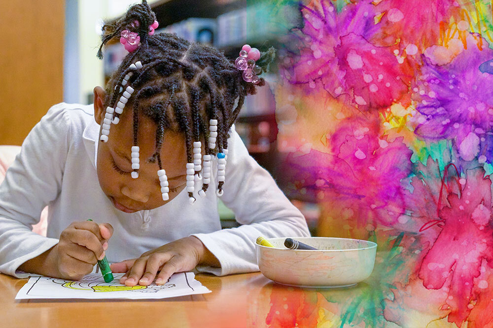 kids art and craft events - a little artist drawing at Pratt Library and colorful paper art