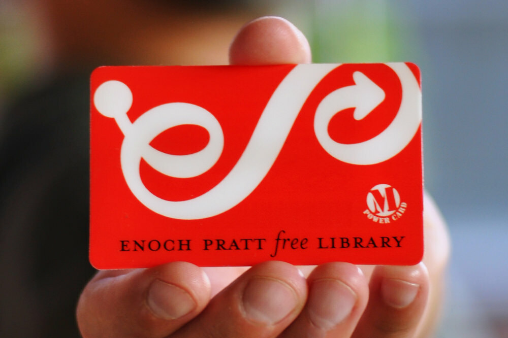 Pratt Library card in hand