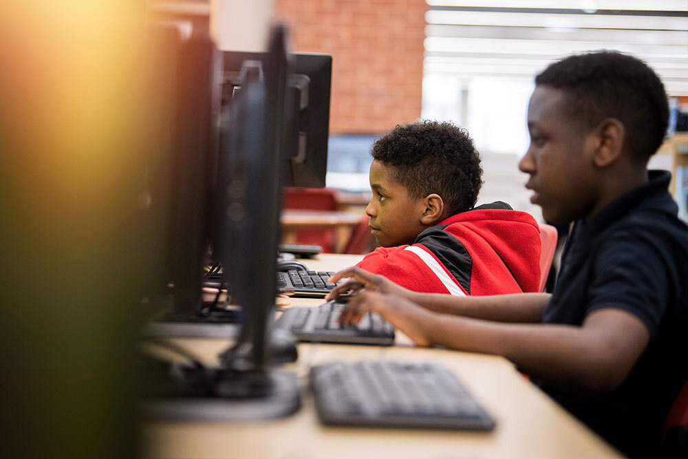 public computers - two boys using computers