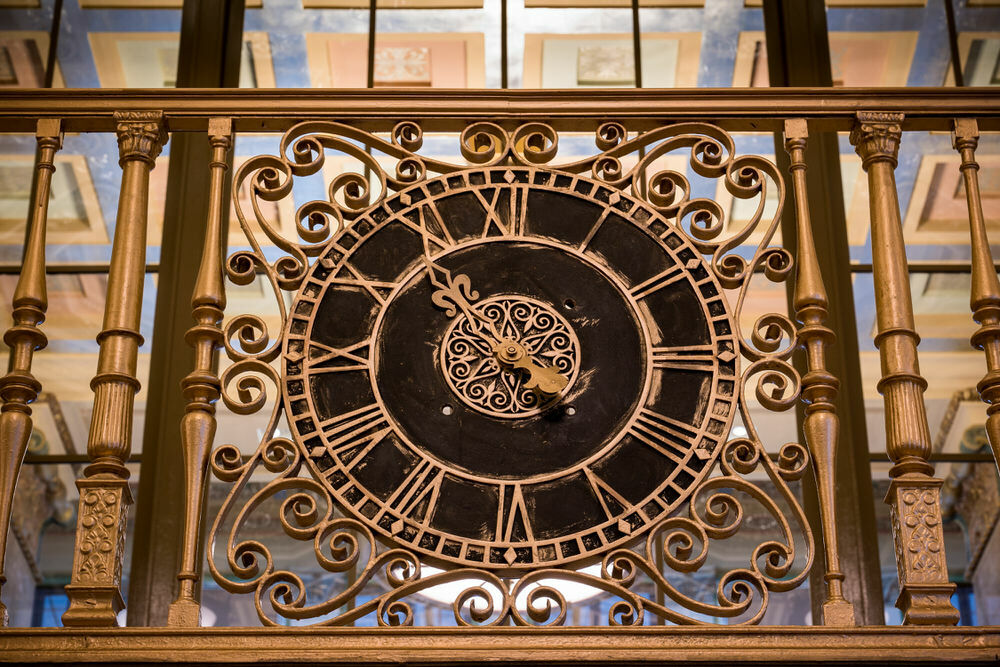 a decorative clock on a Central Library balcony