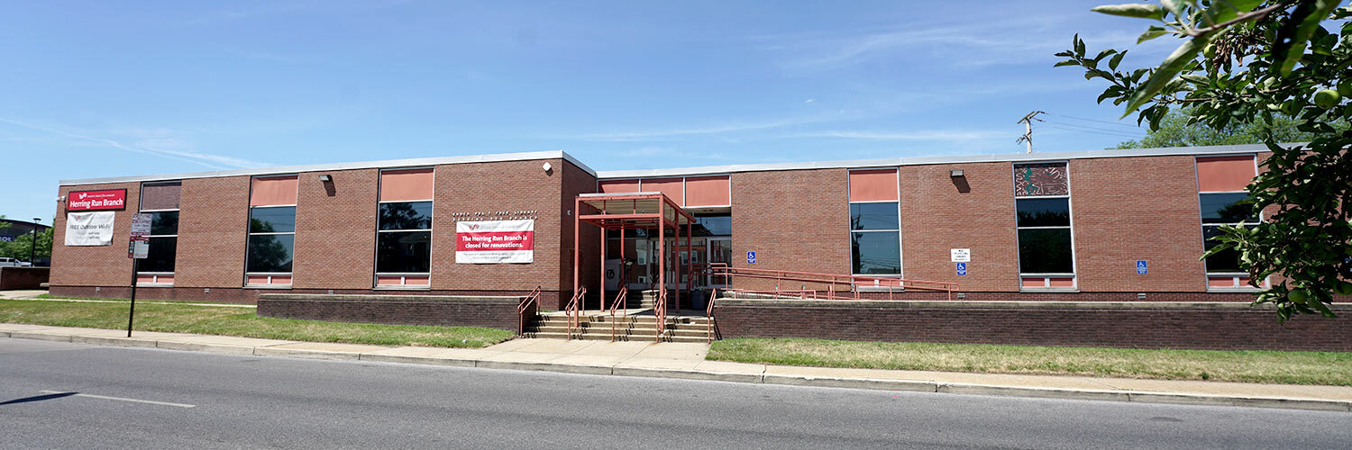 Herring Run exterior with signs