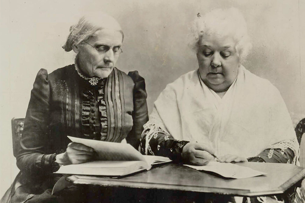 Susan B. Anthony and Elizabeth Cady Stanton at a table. Library of Congress.