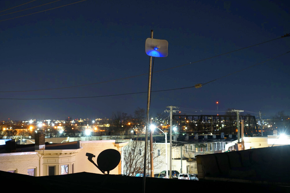 rooftop antenna against the Southeast city skyline
