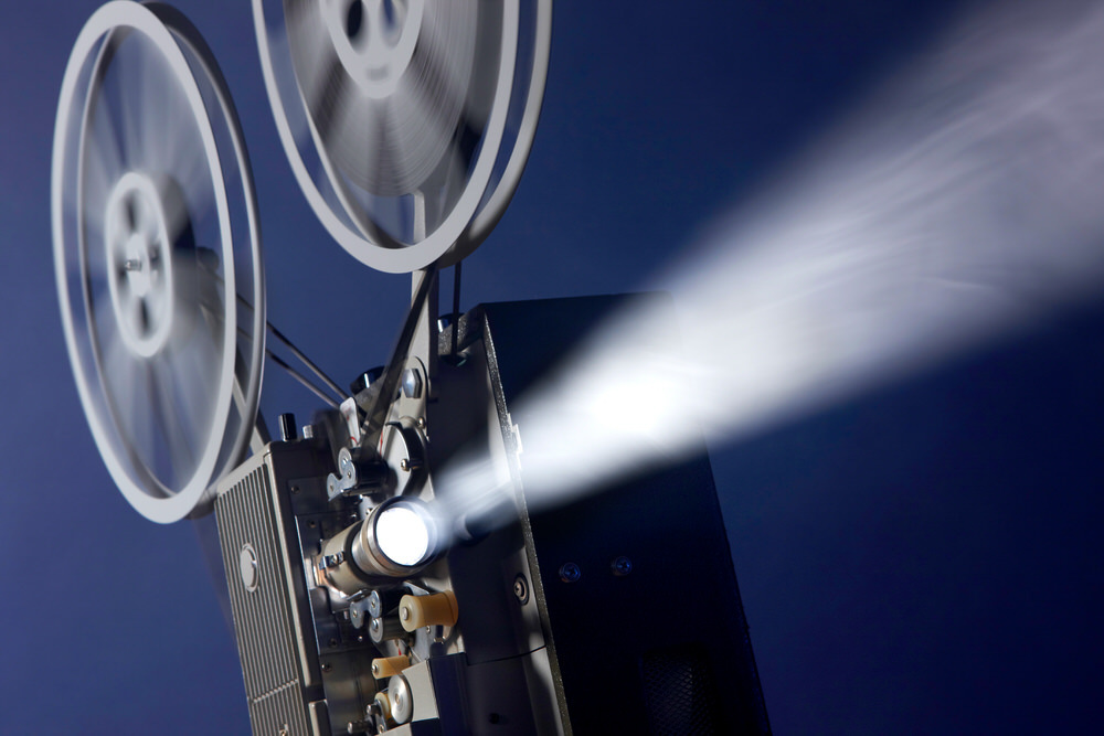 16mm film projector reels in motion