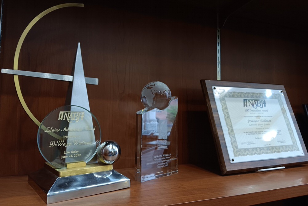 DeWayne Wickham Collection awards on a shelf.