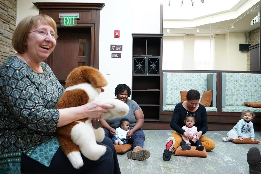 Children's Department - storytime with a librarian, parents, and toddlers