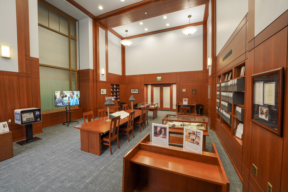 DeWayne Wickham Collection room with tables, displays