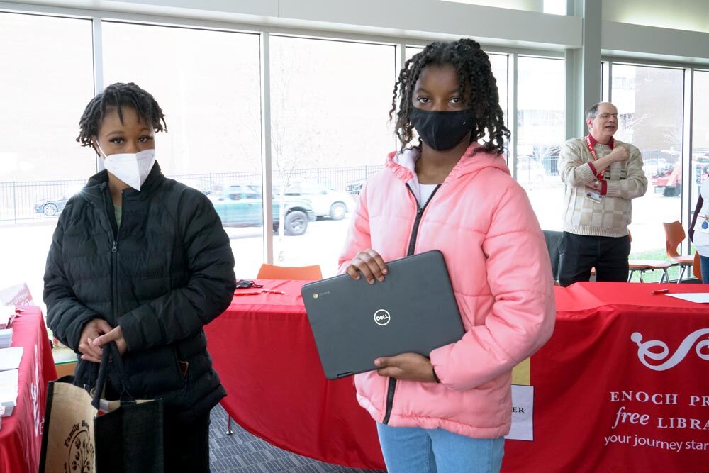 Dell laptops chromebooks - 2 women standing in the lobby at Orleans Street Branch