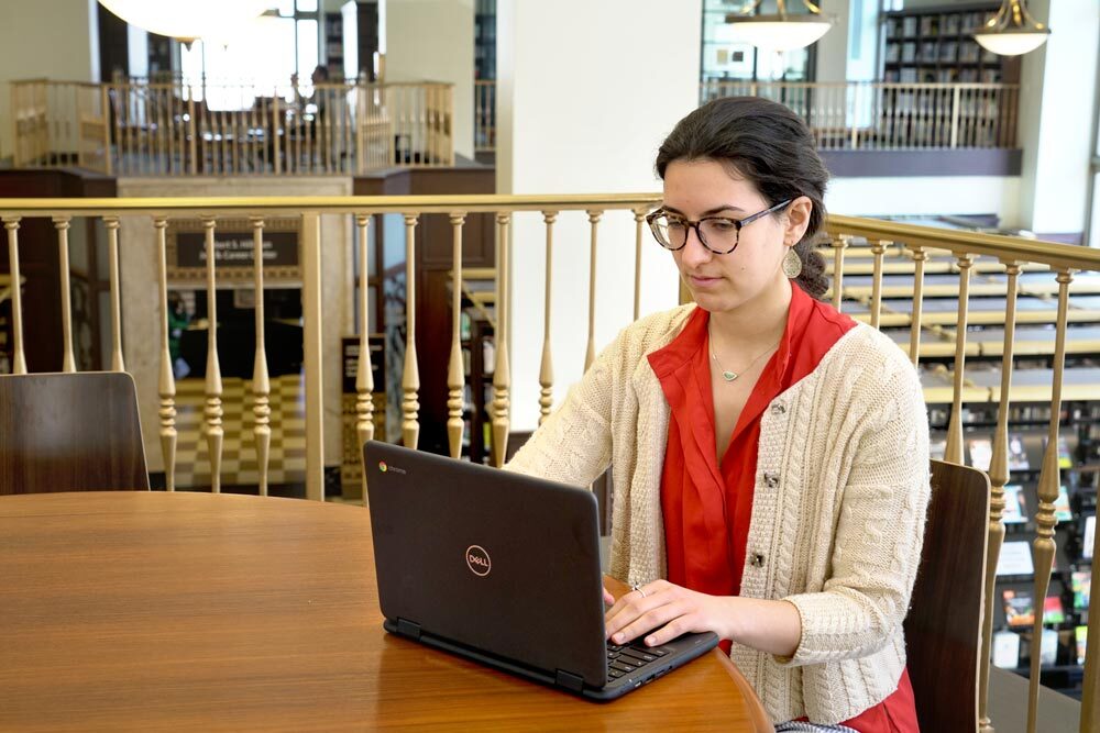Dell woman using a laptop