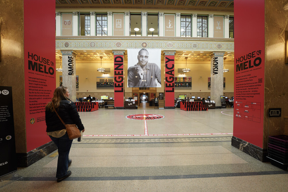 House of Melo exhibit at Pratt Library - Legend, Legacy and portrait sen from the netrance