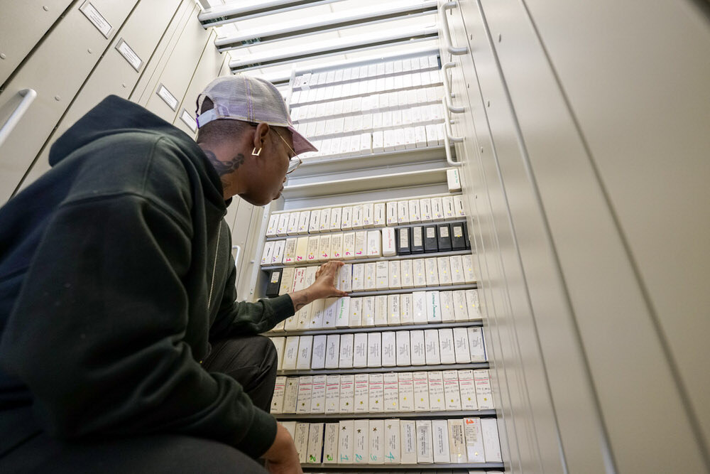 SHAN Wallace Artist in Residence at Pratt Library searching the archives