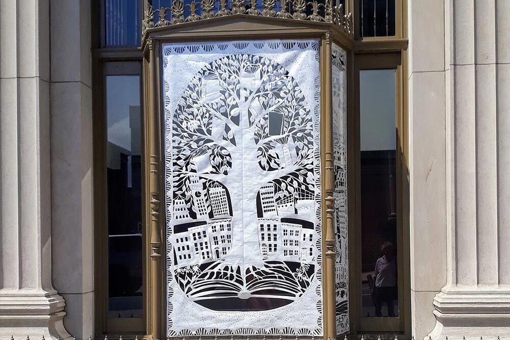 Pratt Library window art by Annie Howe, photo by Nicole Munchel