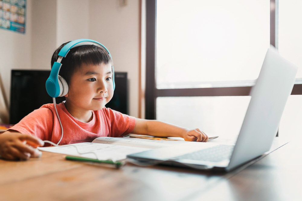 boy using a laptop