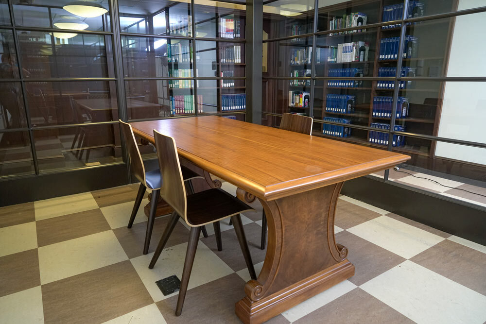 meeting room 1804 at the Central Library - a table, chairs, a checkerboard floor, and glass walls