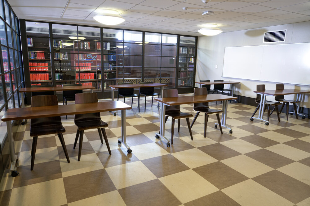 meeting room 1801 at the Central Library - a glass enclosure with tables chairs, and a whiteboard