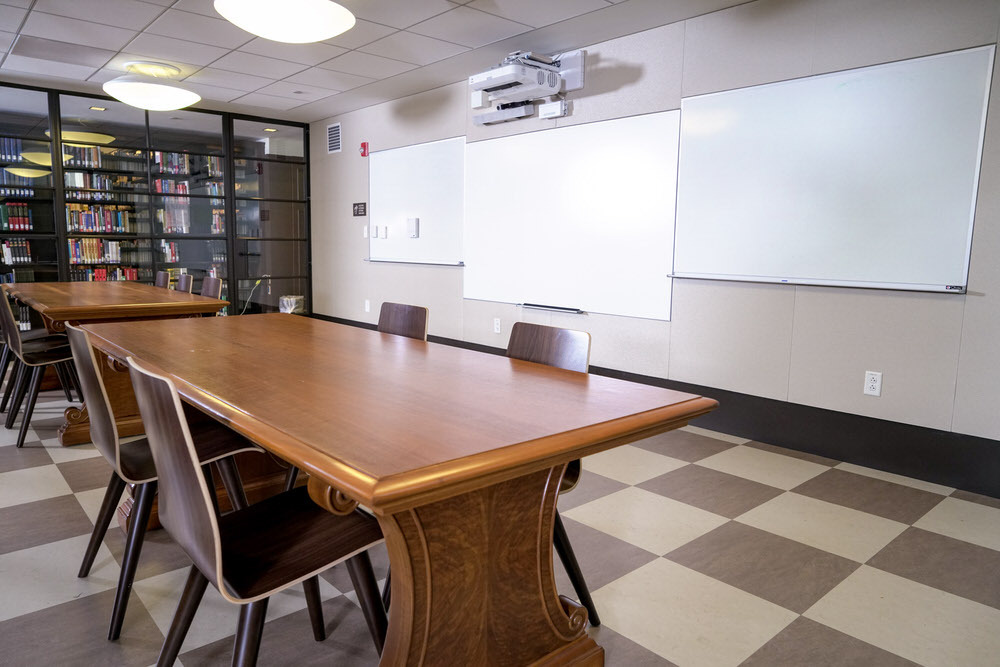 meeting room 1802 at the Central Library - tables, chairs, and three whiteboards