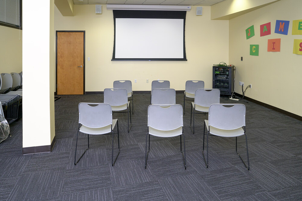 Cherry Hill meeting room showing chairs facing a projection screen