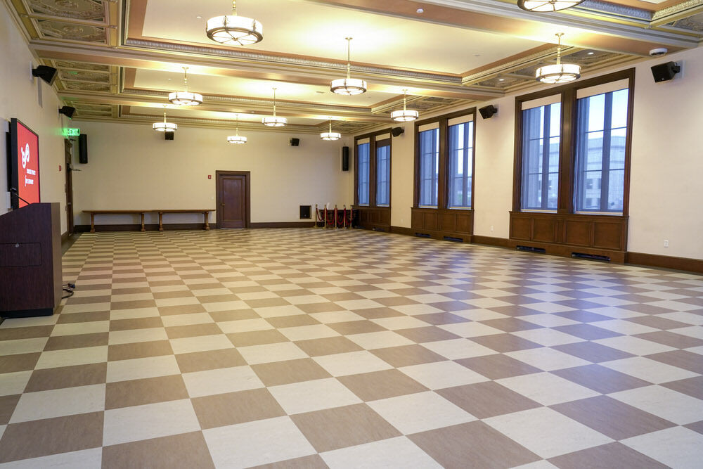 Creative Arts room at the Central Library - empty room with checkerboard floor and windows in the evening