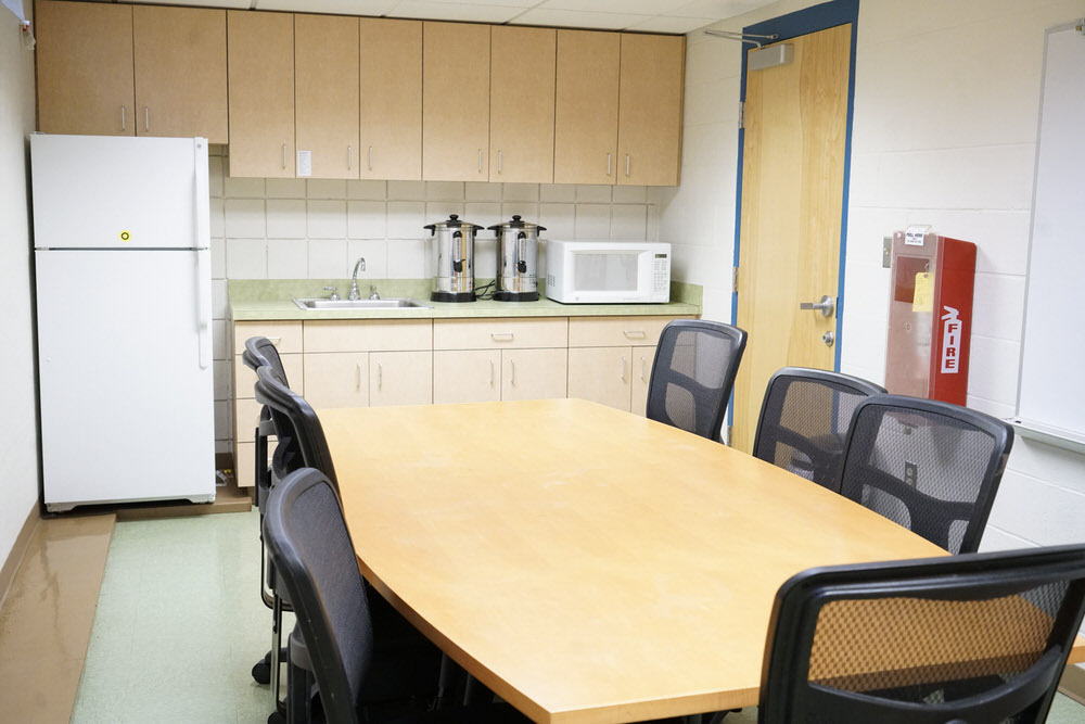 Edmondson Avenue Meeting Room - kitchenette room with table, chair, cabinets, refridgerator, mircowave