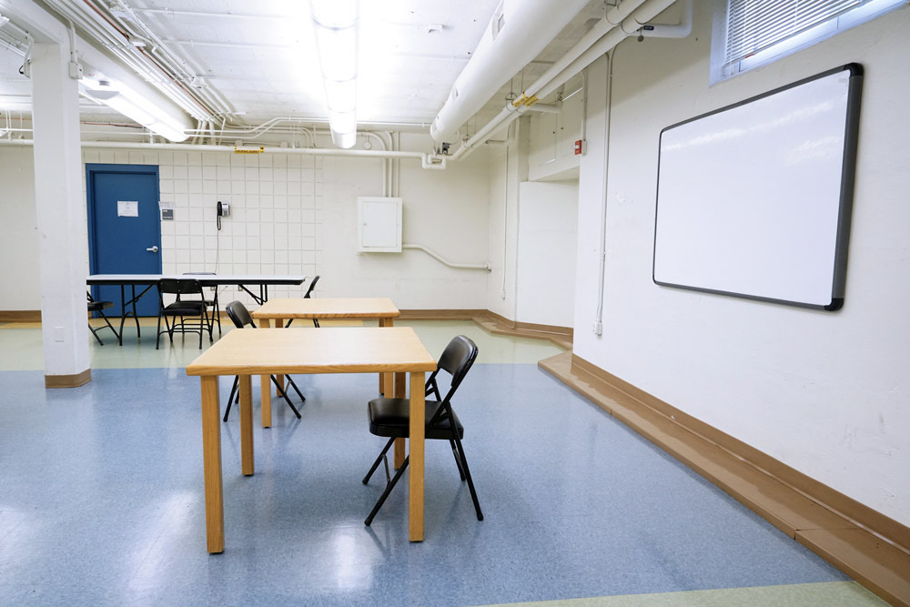 Edmondson Avenue Meeting Room - whiteboard, tables and chairs