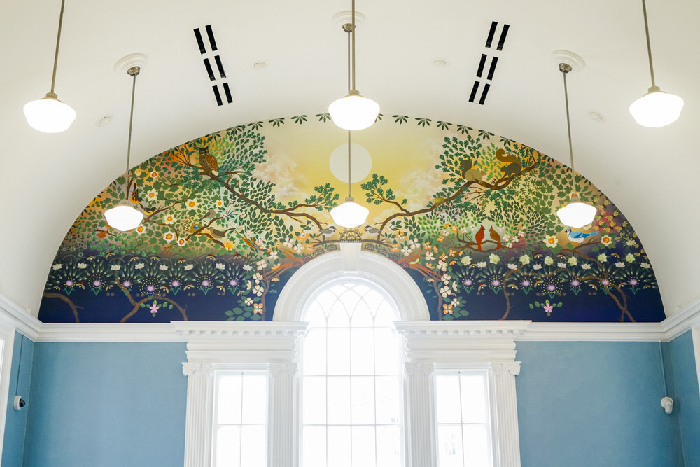 Hampden inside detail - mural art showjng decorative nature scenes above a window archway