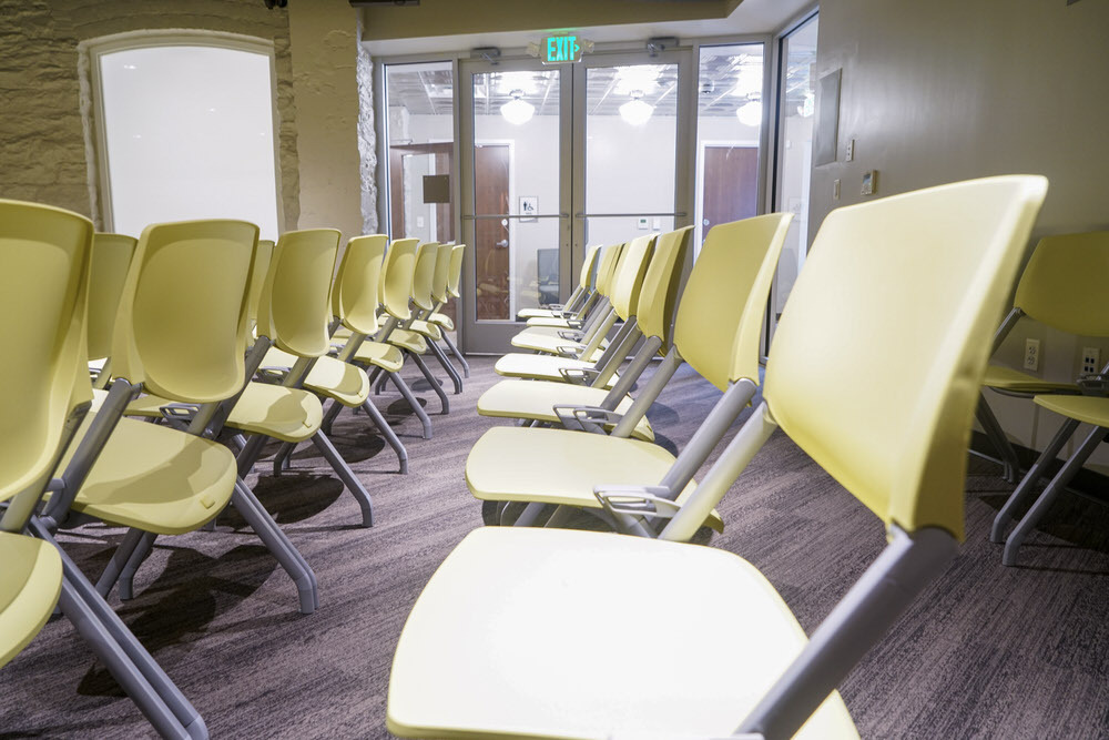 Hampden meeting room - chairs from the side and daylight from the hallway