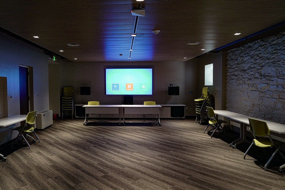 Hampden meeting room - screen in a darkened room