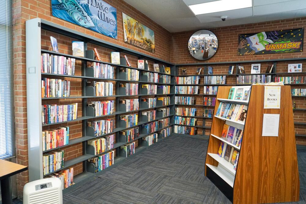 Herring Run corner of a room with bookshelves