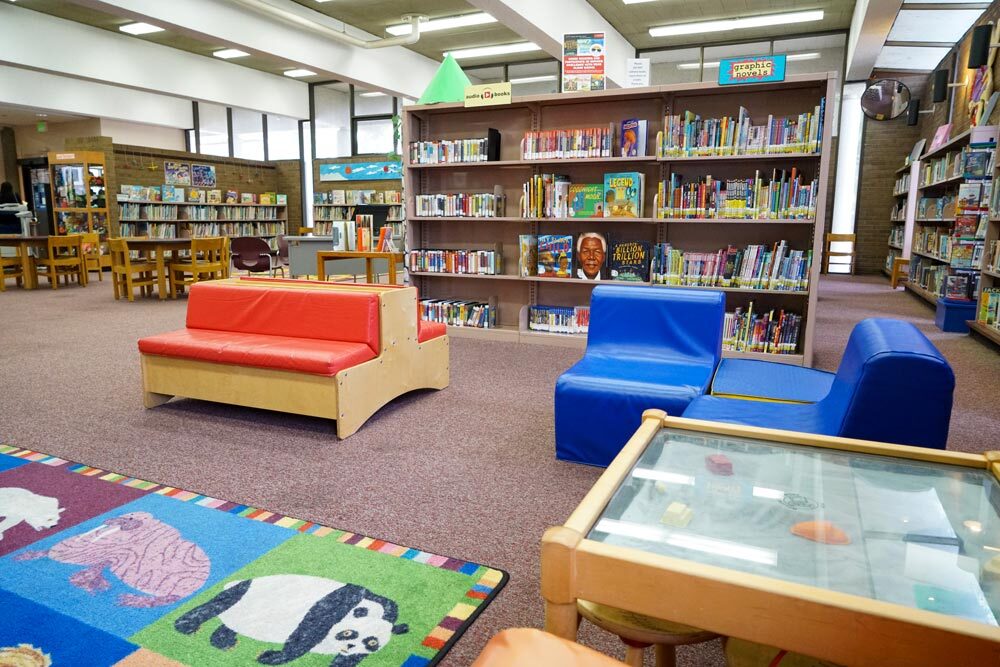 Light Street inside - bookshelves, soft chairs