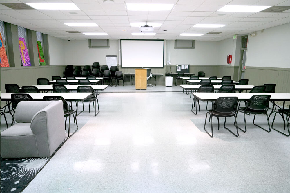 Patterson Park meeting room - wide view facing screen