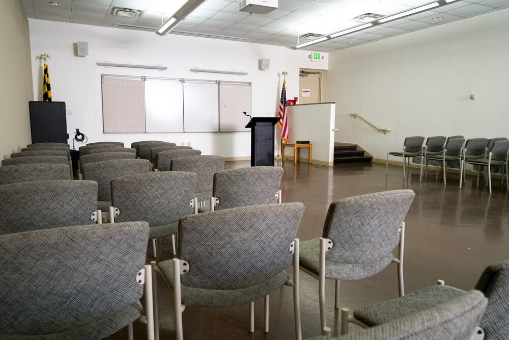 Reisterstown Road meeting room showing chairs and a whiteboard
