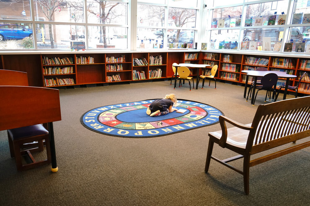 Southeast kids area rug and bookshelves