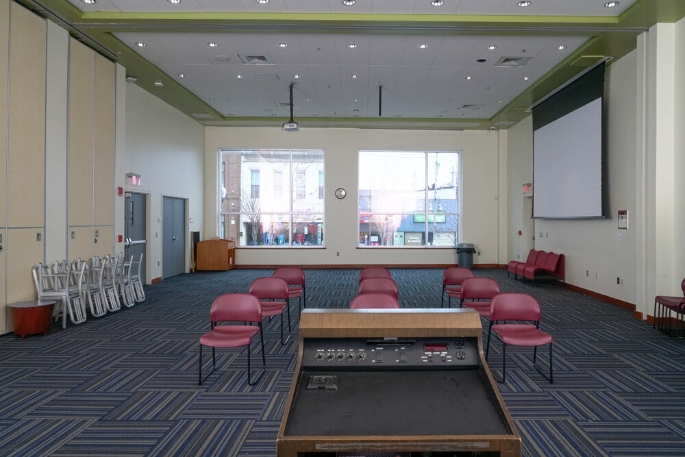 Southeast large meeting room - auditorium facing windows, from the podium